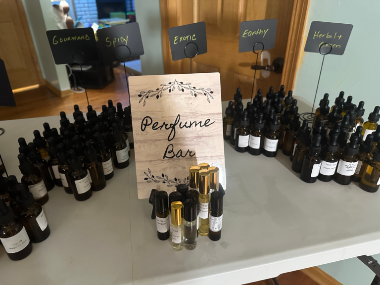 Glitters & Grace perfume bar set up for a private party