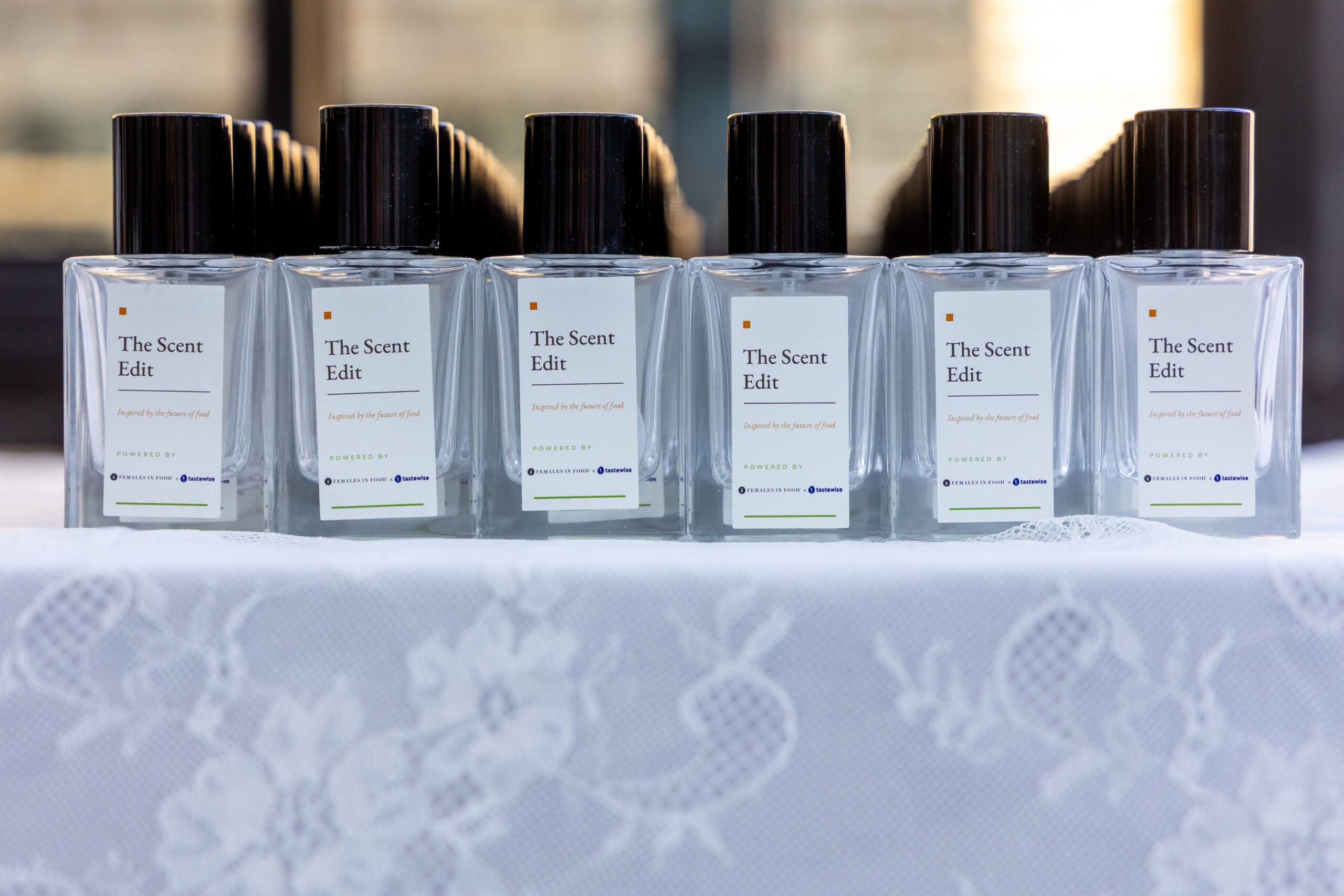 A perfumer composing a custom fragrance in the lab