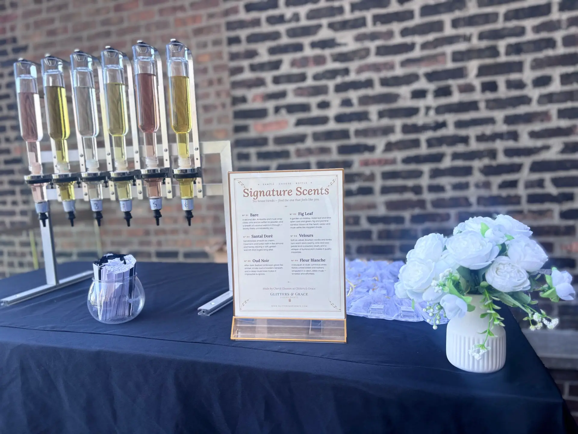 Corporate events Chicago: a styled Glitters & Grace perfume bar set up in a downtown Chicago event venue