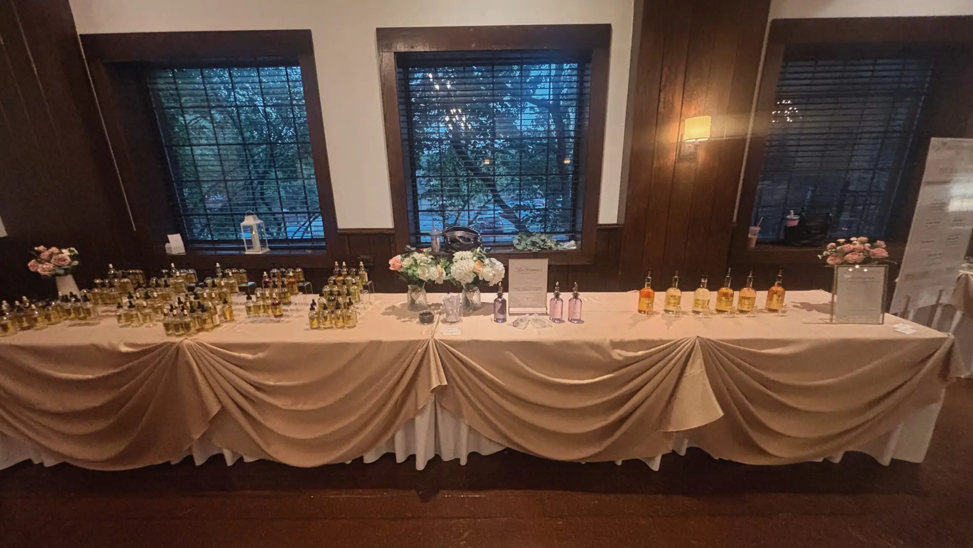 Summer and fall wedding scents: a wedding perfume bar styled with crystal bottles