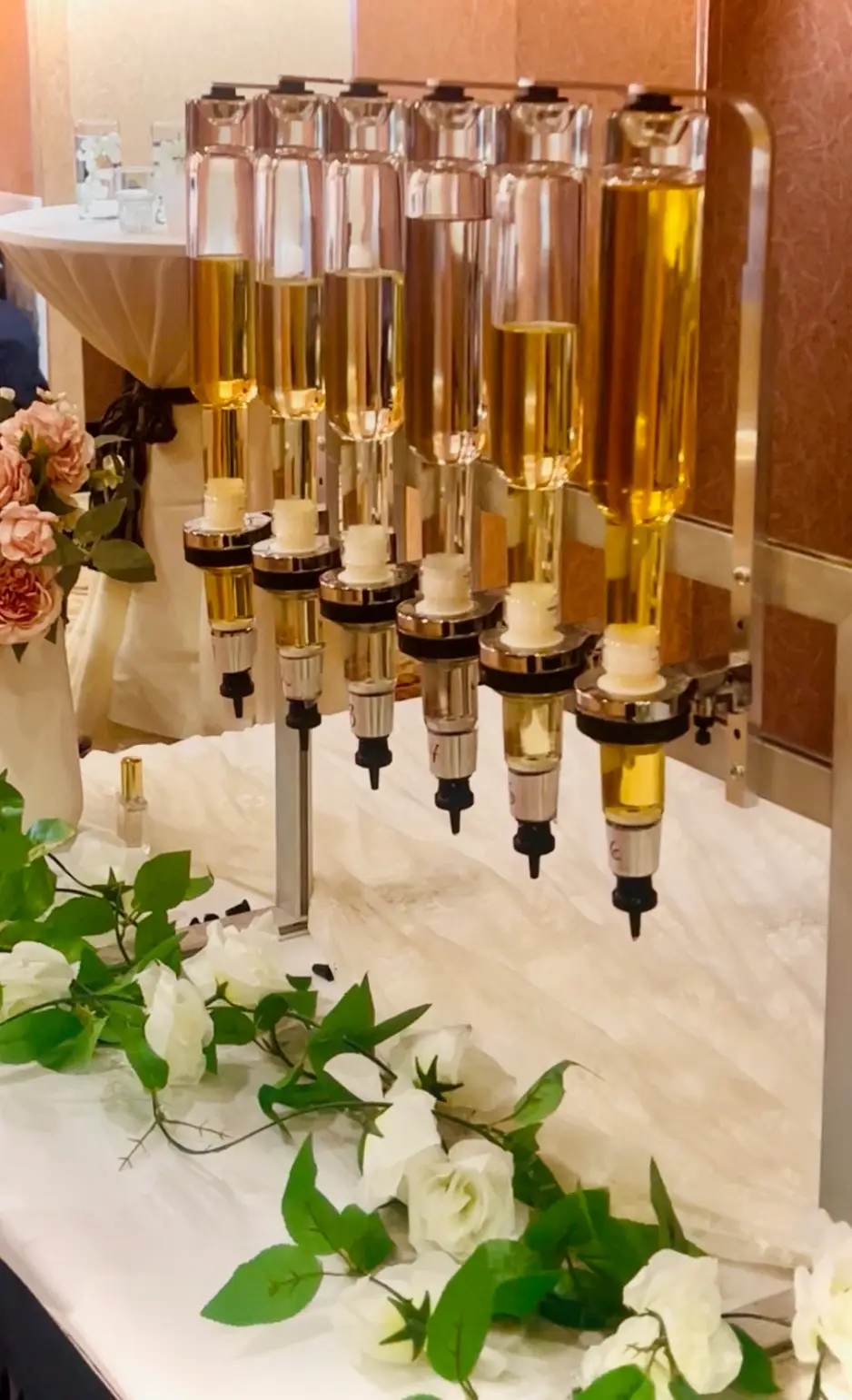 A guest choosing her fragrance at the bar