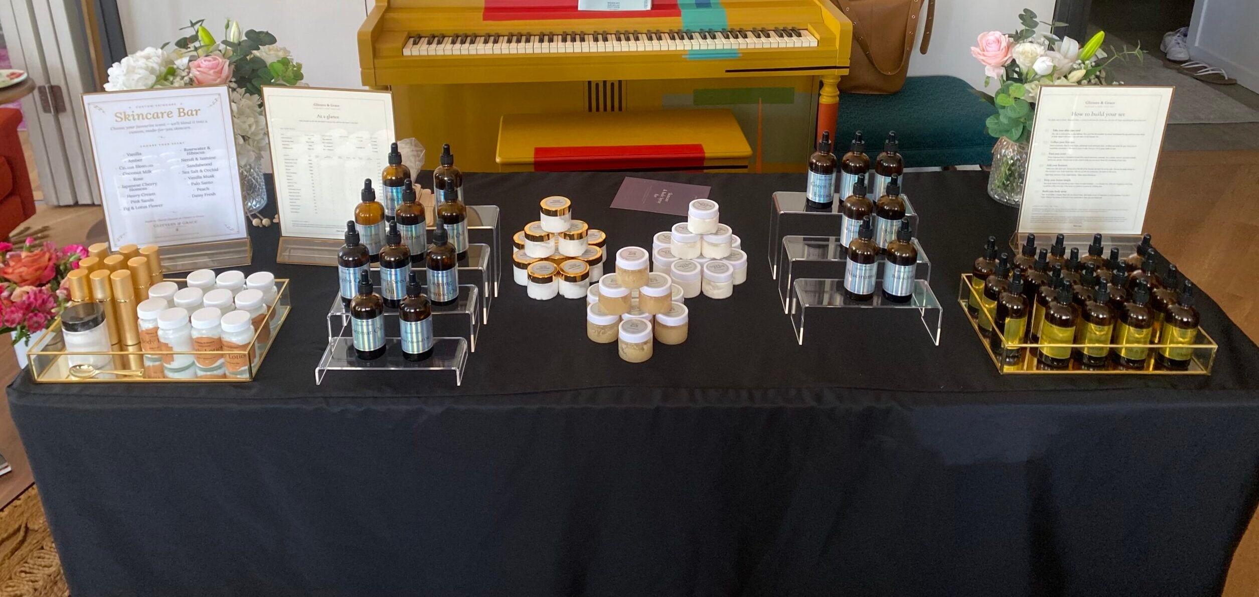 Guests blending their own products at a Glitters and Grace mobile skincare bar
